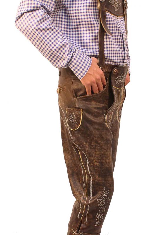 Side view of brown embroidered long Bundhosen with suspenders and purple checkered shirt. - Lederhosen For Sale