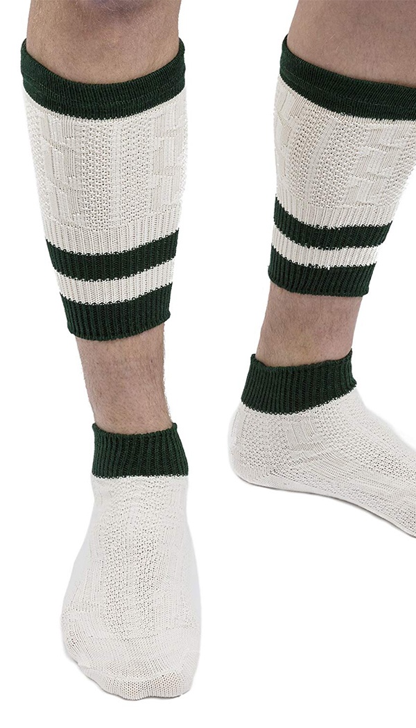 Close-up of a person wearing traditional two-piece Bavarian Loferl calf warmers and ankle socks in cream and green. - Lederhosen For Sale