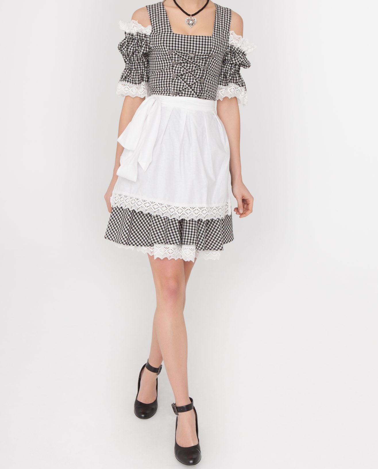 Woman posing in black checkered Dirndl with white apron. - Lederhosen For Sale