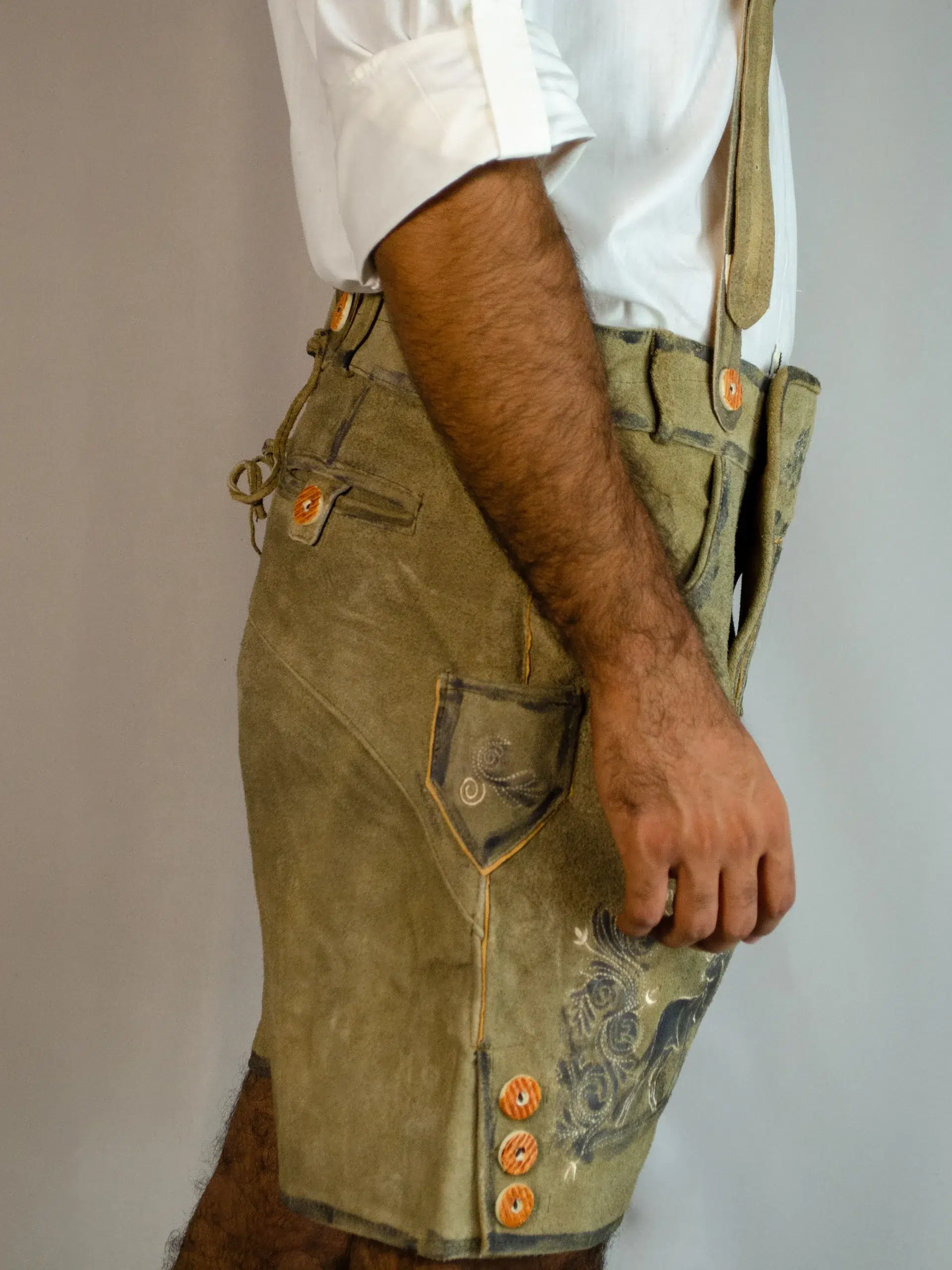 Side view of man in shaded brown Trachten Lederhosen. - Lederhosen For Sale
