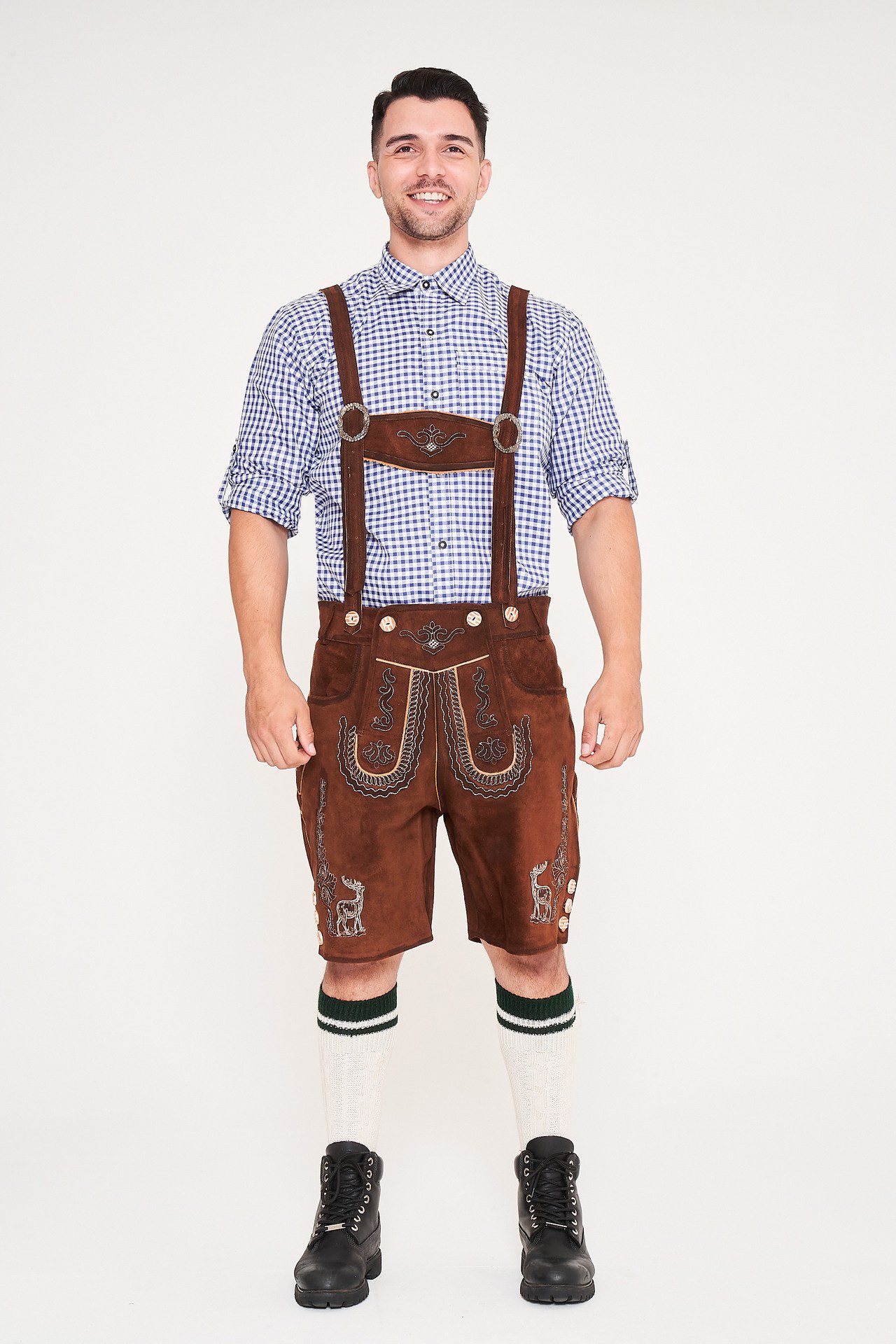 Man in traditional German Lederhosen and blue checkered shirt for Oktoberfest. - Lederhosen For Sale